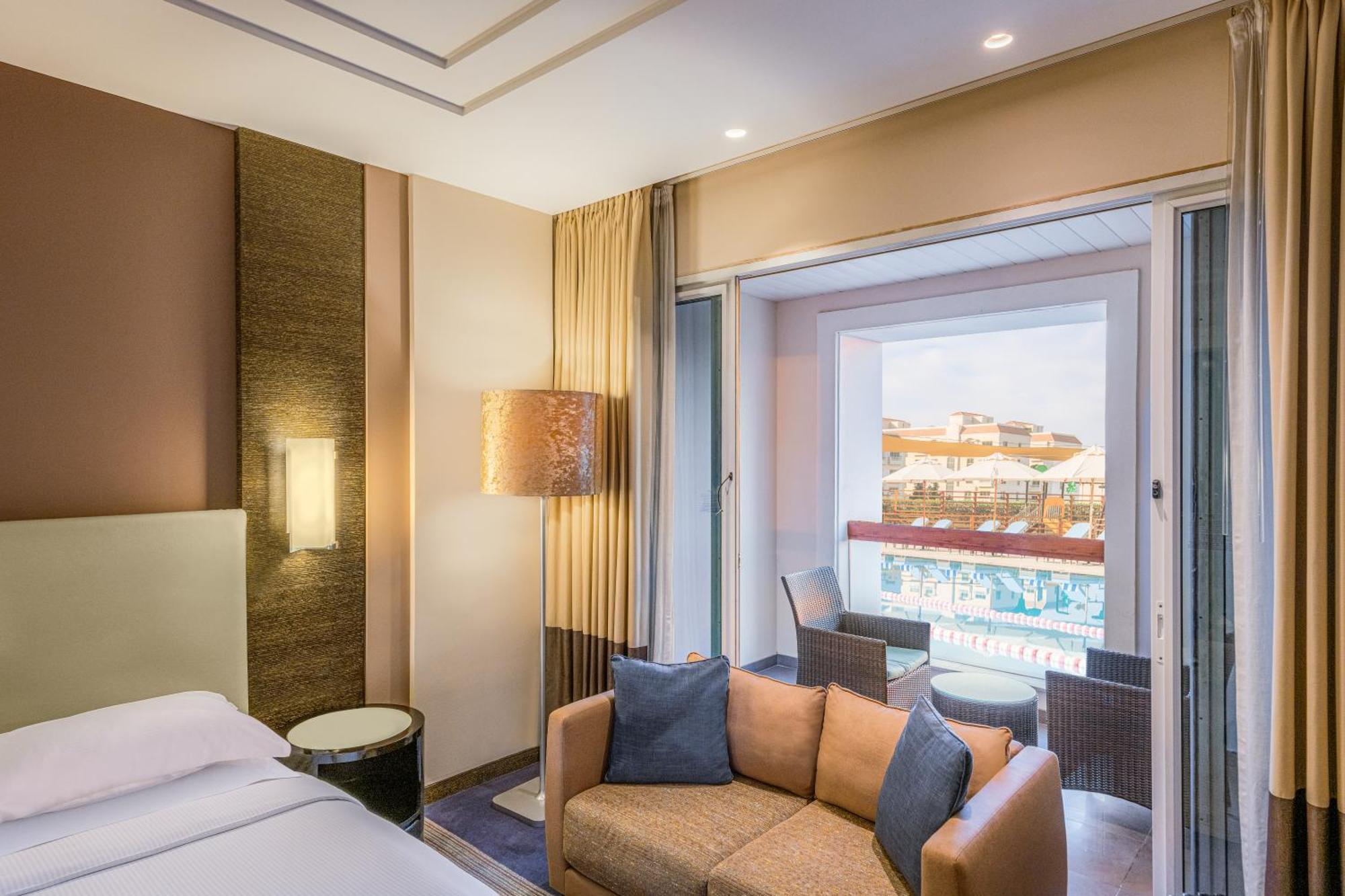โรงแรมฮิลี่ เรย์ฮาน บาย โรทาน่า อัลอิน ภายนอก รูปภาพ Deluxe Room with Pool Access