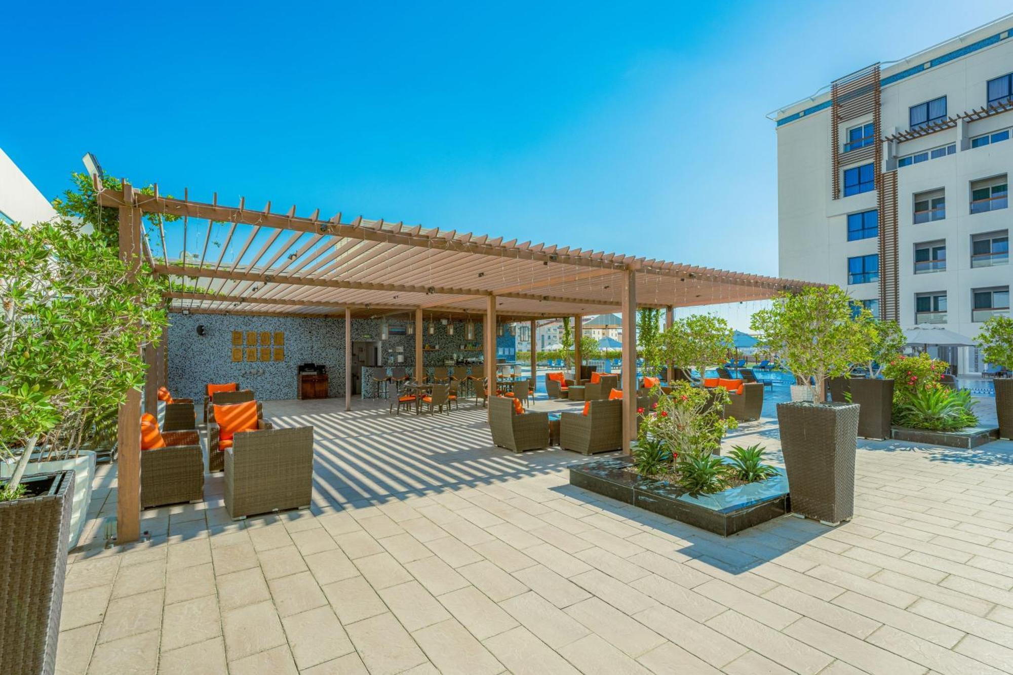 โรงแรมฮิลี่ เรย์ฮาน บาย โรทาน่า อัลอิน ภายนอก รูปภาพ Rooftop bar